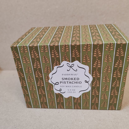 Cherie 5.5oz scented candle in porcelain lides pot with drawer packaging. Scent of Smoked Pistachio.