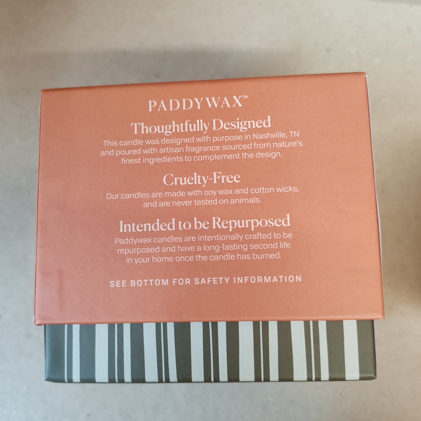 Bistro 8oz pumpkin scented candle in a ceramic pot.