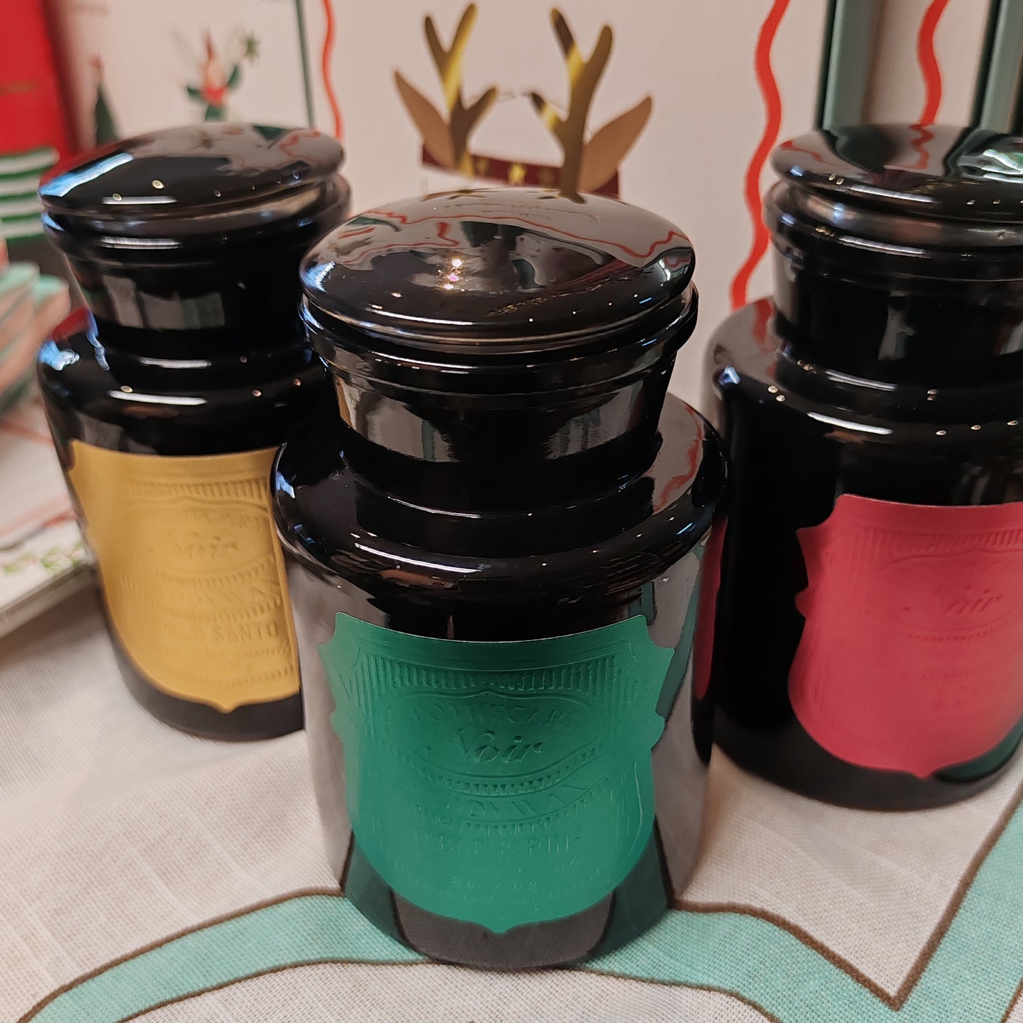 Black Apothecary Jar green foil label. Scent of Tabac and Pine