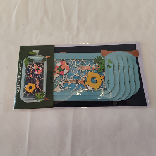 Message in a bottle swimming greeting card